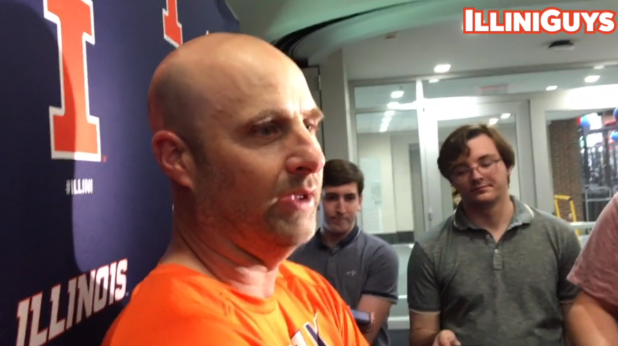 Illini Offensive Coordinator Barry Lunney Jr. talks to reporters