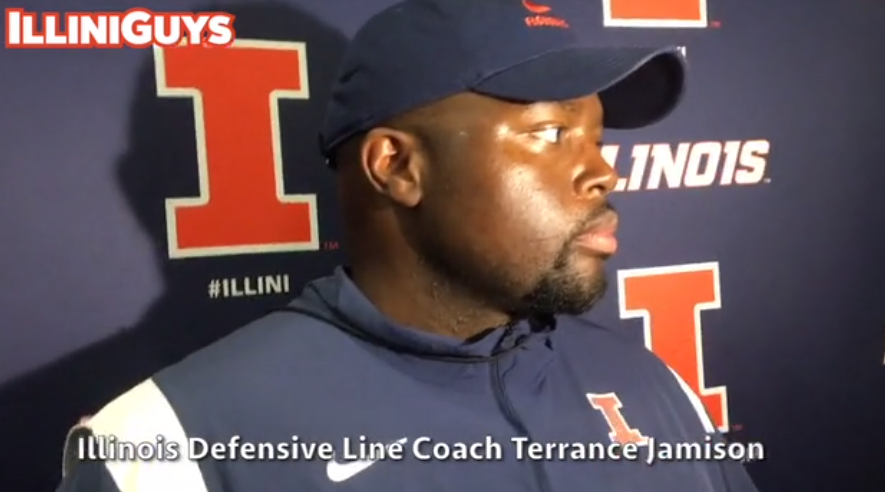 Illini defensive line coach Terrance Jamison talks after practice