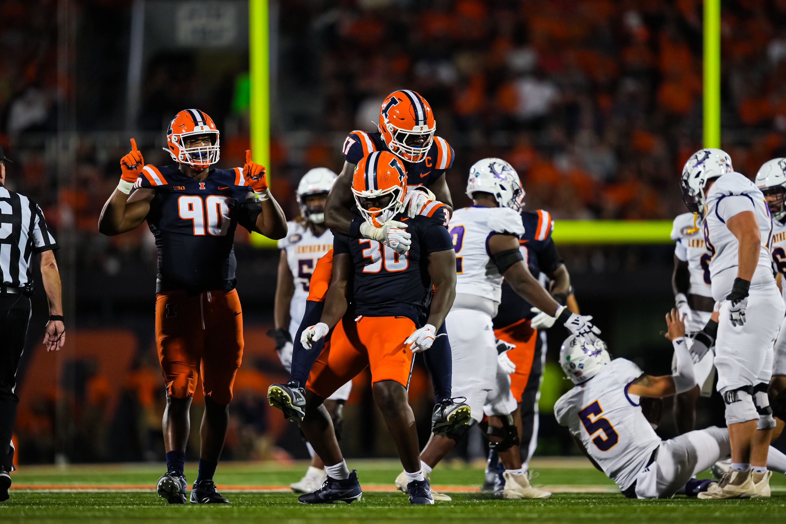 Inside Illini’s D-Line Depth Known as ‘The 300-Pound Club’