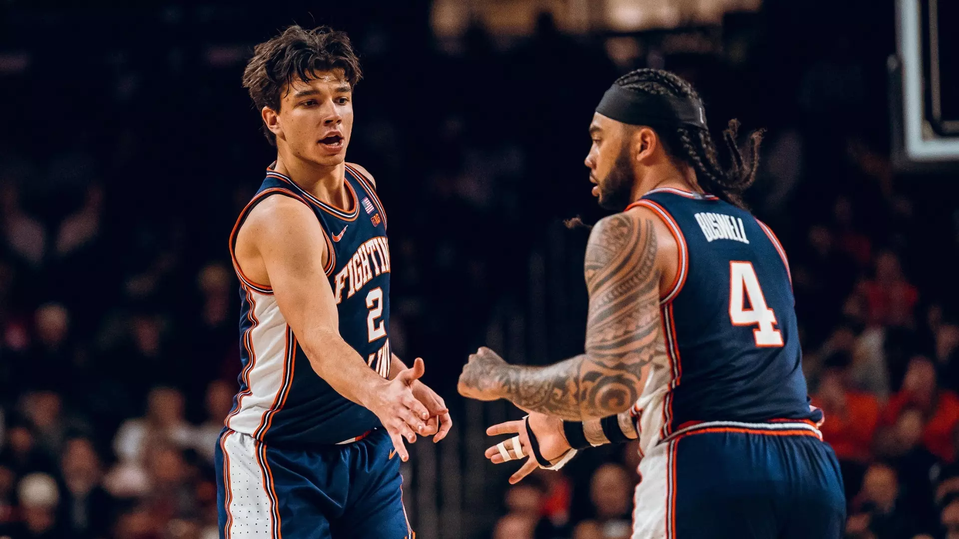 Wrapped Hand, Relentless Game: Boswell and Stojakovic are the Batteries in an Illini Charge Over USC